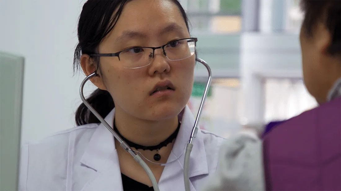 Chinese nursing student wearing a stethoscope.